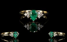 Ladies Attractive Emerald And Diamond Set Dress Ring.