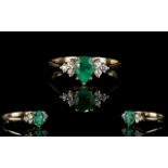 Ladies Attractive Emerald And Diamond Set Dress Ring.