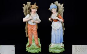 German - Late 19th Century Pair of Hand Painted Bisque Figures Depicting Male and Female Wood