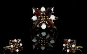 Ladies 9ct Gold Attractive Garnet and Opal Set Dress Ring.