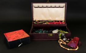 Jewellery Box Containing A Quantity Of Costume Jewellery Hinged leather bound box with internal