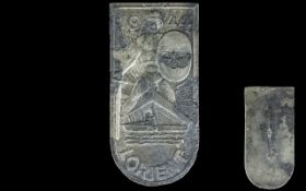 WWII Interest German 1944 Lorient Arm Shield cast metal shield depicting German soldier with