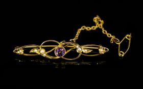 Antique Period Attractive 9ct Gold Amethyst And Seed Pearl Set Brooch with attached safety chain.