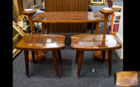 A Set Of Three Teak Coffee Tables Circa 1950's/60's With turned tapering splayed legs with chrome