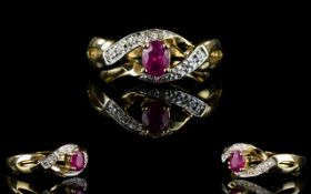 Ladies 9ct Gold Ruby And Diamond Set Dress Ring. The Ruby is of excellent colour.