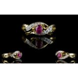 Ladies 9ct Gold Ruby And Diamond Set Dress Ring. The Ruby is of excellent colour.