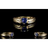 Ladies 9ct Gold Diamond And Tanzanite Set Dress Ring.