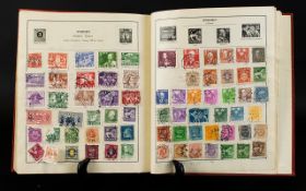 Red Strand Stamp Album full of stamps from around the world.