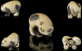 Chinese 19th Century Nice Quality Signed Carved Ivory Netsuke in the form of a baby panda.