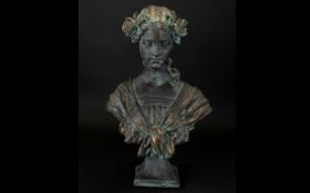 A Reproduction Art Nouveau Bust In The Form Of A Young Maiden Plaster bust with aged verdigris