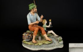 Capodimonte Early Hand Painted And Signed Ceramic Figure Father and son fishing on the beach,