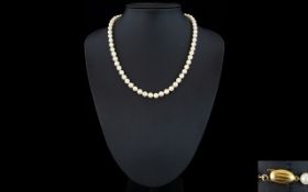 Good Quality String Strand Cultured Pearl Necklace with 9ct Gold Clasp. 18 Inches In length.