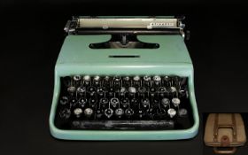 Olivetti Vintage Lettera 22 Portable Typewriter with carrycase.
