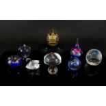 A Good Collection of Vintage Glass Paperweights plus a Swarovski crystal swan figure.