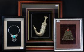 A Collection Of Framed Decorative Middle Eastern Items Three in total,