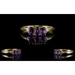 Ladies 9ct Gold Three Stone and Diamond Dress Ring the three amethysts of excellent colour and