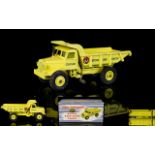 Dinky Supertoys, Die Cast Model 965 Euclid Rear Dump Truck. Circa 1950's yellow colourway.