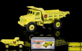 Dinky Supertoys, Die Cast Model 965 Euclid Rear Dump Truck. Circa 1950's yellow colourway.