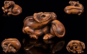 Japanese - 19th Century Superb Carved Boxwood Signed Netsuke. Depicts a Japanese Oxon In a Resting