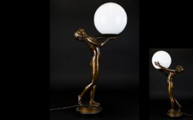 A Bronze Art Deco Period Table Lamp In The Form of A Female Nude Wonderfully cast nude female