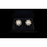 18ct White Gold - Pair of Nice Quality Diamond and Pearl Set Earrings. The Central Cultured Pearl to