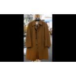 A Gents Vintage Crombie Coat Heavyweight camel wool coat with taupe poly-satin lining,