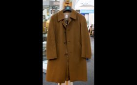 A Gents Vintage Crombie Coat Heavyweight camel wool coat with taupe poly-satin lining,