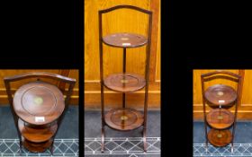 Edwardian Mahogany Three Tier Folding Cake Stand Height 33 inches, circular top.