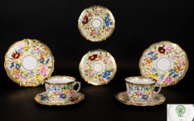 Hammersley Queen And Pattern Pair Of Breakfast Cups And Saucers with heavy acid gold borders.
