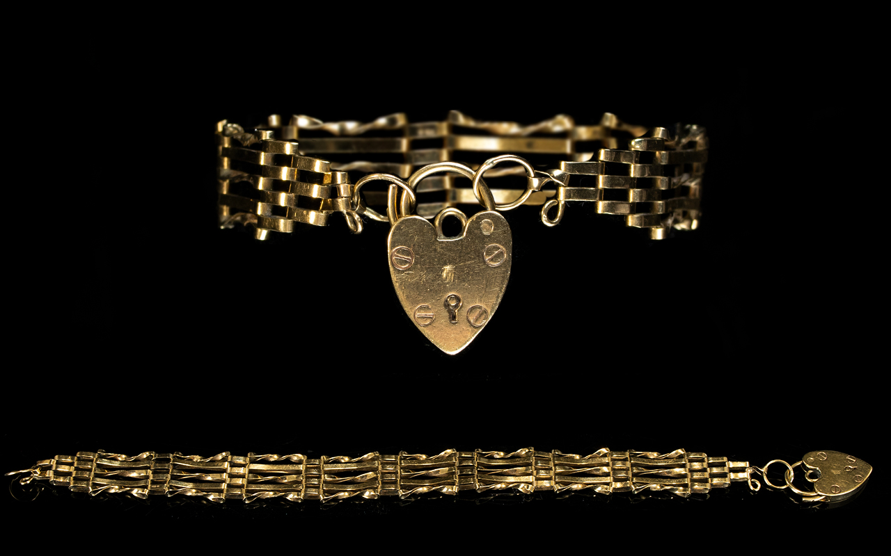 1970's 9ct Gold 5 Bar Gate Bracelet with Attached 9ct Gold Heart Shaped Padlock. Fully Hallmarked.