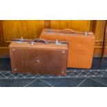 Vintage Leather Suitcase together with another vintage Antler suitcase.