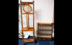 Early 20th Century Hall Stand of plain form, central bevelled glass mirror, turned supports.