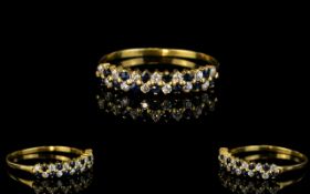 18ct Gold Nice Quality Sapphire And Diamond Cluster Dress Ring. Not marked but tests 18ct Gold.