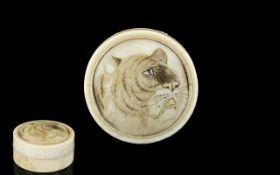 Japanese 19thC Good Quality Circular Lidded Ivory Pill Box with carved image of a tiger to cover.