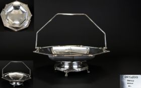 Sheffield Plate Swing Handled Pedestal Dish with Celtic knotwork border and raised on four claw