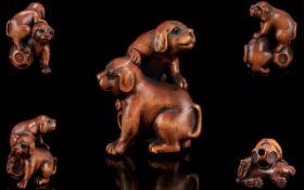 Japanese - Early 20th Century Superb Quality Carved Boxwood Netsuke. Depicts Two Puppies at Play