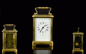 A Brass 4.5 Inch Tall Carriage Clock with Bevelled Glass, In Good Order and Working Condition,