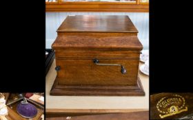 Antique Gramophone Oak cased Table top gramophone with hinged lid to top,