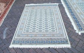 A Large Woven Silk Carpet Keshan rug with midnight blue ground and traditional Middle Eastern