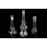 Pair of Clear Molded Glass Vases with silver rims,