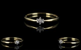 A Gold And Diamond Set Cluster Ring Delicate ring with small starburst setting and small diamond