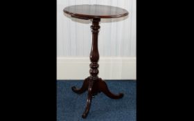 Mahogany Wine Table with turned base, trefoil legs. 29 inches high and 18 inches wide.