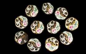 A Set Of Victorian Brass And Enamel Buttons Eleven buttons of floral form with reticulated