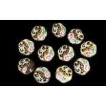 A Set Of Victorian Brass And Enamel Buttons Eleven buttons of floral form with reticulated