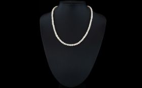 Cultured Pearl Necklace Collar style necklace with silver diamond clasp