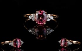 Gold Diamond Gem Cluster Ring Attractive ring set with central rose pink faceted stone,