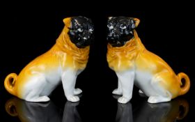 Staffordshire 19th Century Pair Of Porcelain Pug Dog Figures Each with black painted faces and tan