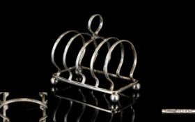 Art Deco Period Nice Quality George Unite Silver 4 Tier Toast Rack, Raised on 4 Ball Feet.