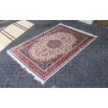 A Large Woven Silk Bokhara Carpet Ornate