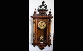 A Vienna Spring Driven Wall Clock walnut